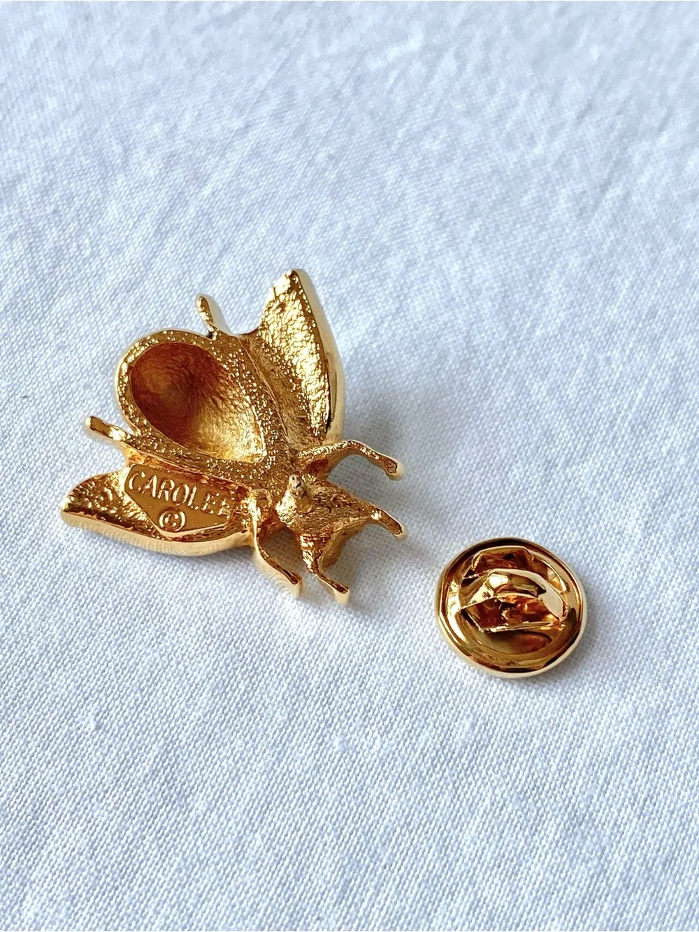 Vintage Carolee Gold-Tone Bee Brooch with Black Enamel, clear and green crystals